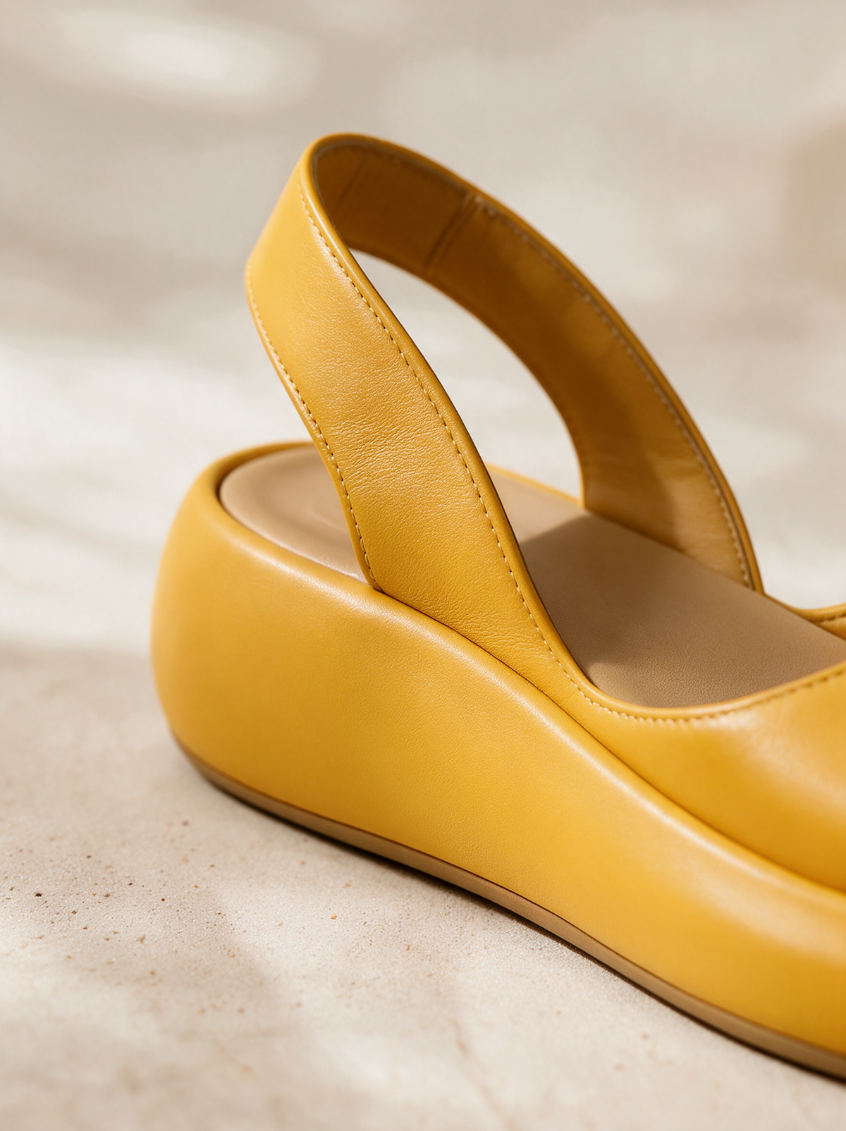 Ottilie slingback strap buckle and platform edge close up
