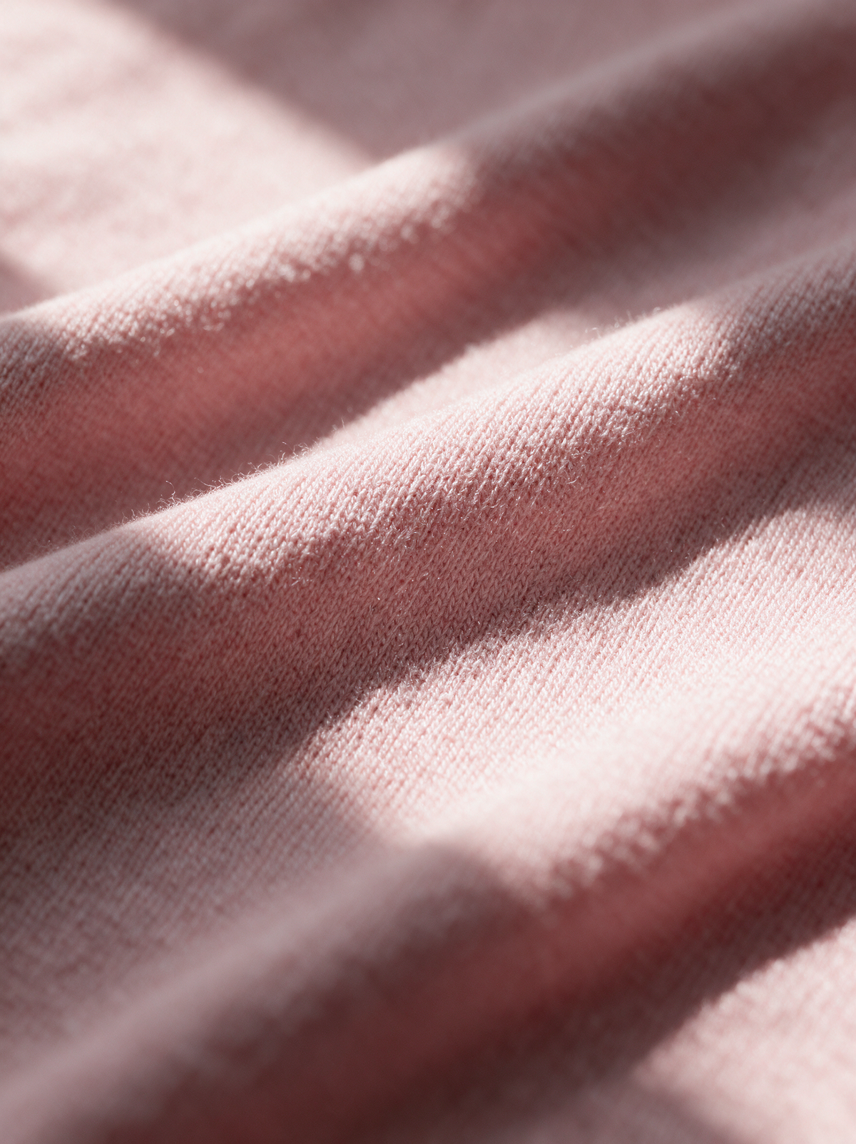 Close-up of the soft knit fabric of the Lucienne top