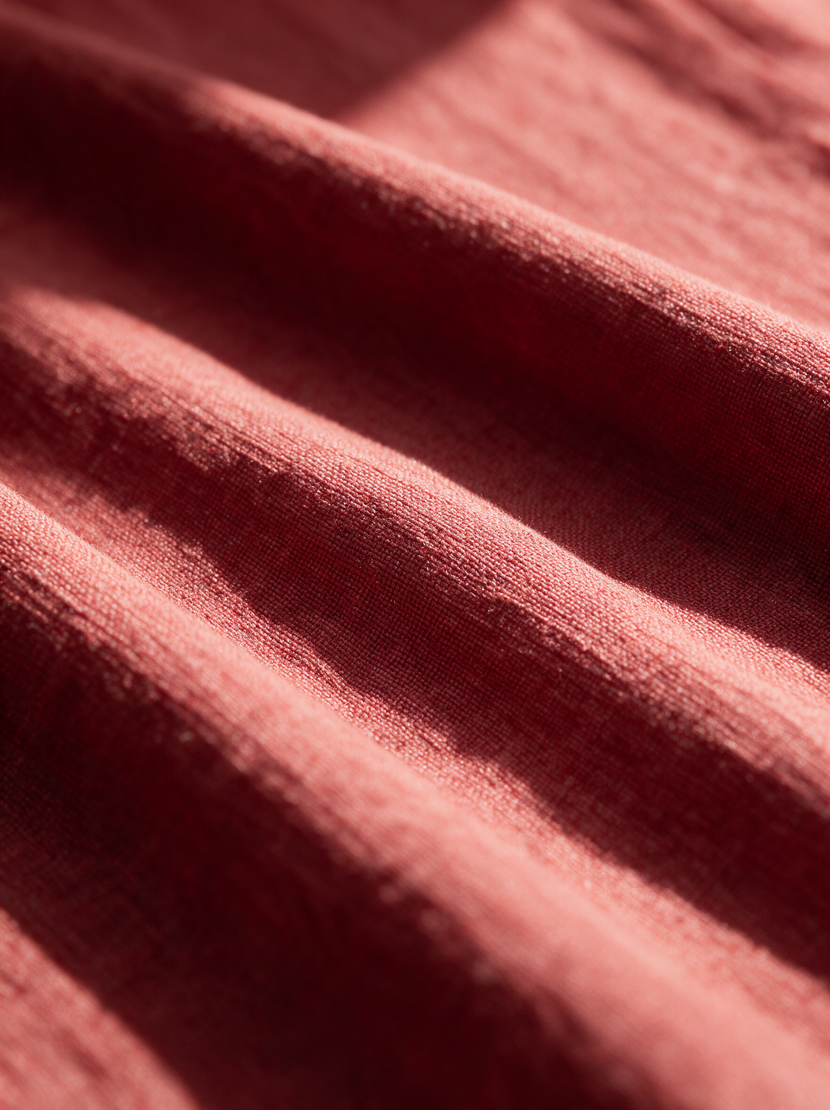 Close-up of the woven fabric of the Marguerite dress