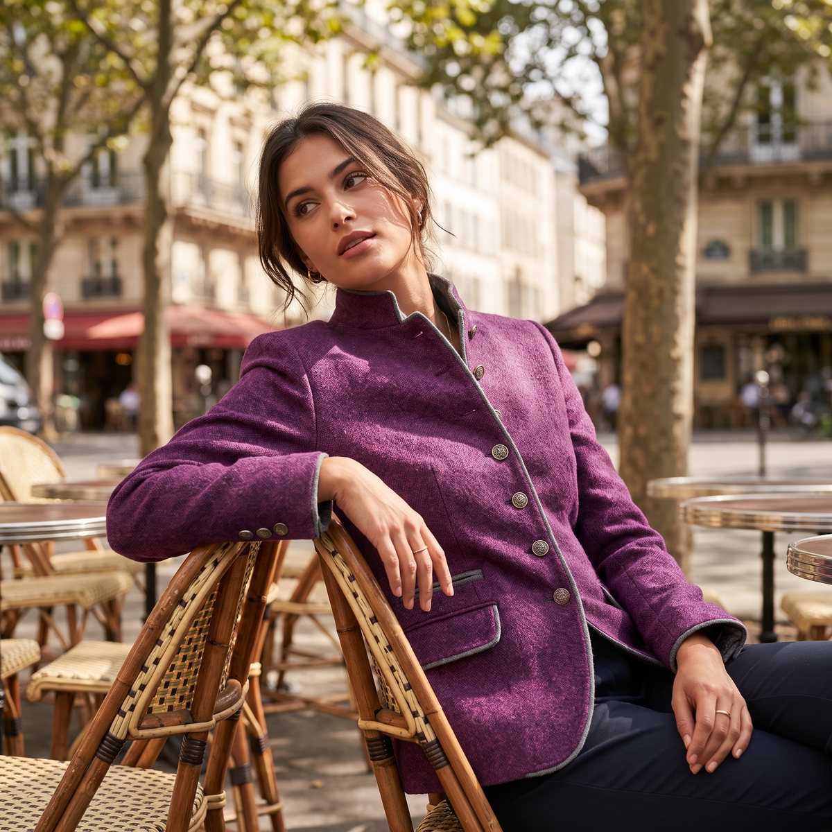 Woman at a boulevard cafe in the Purple contrast-trim blazer