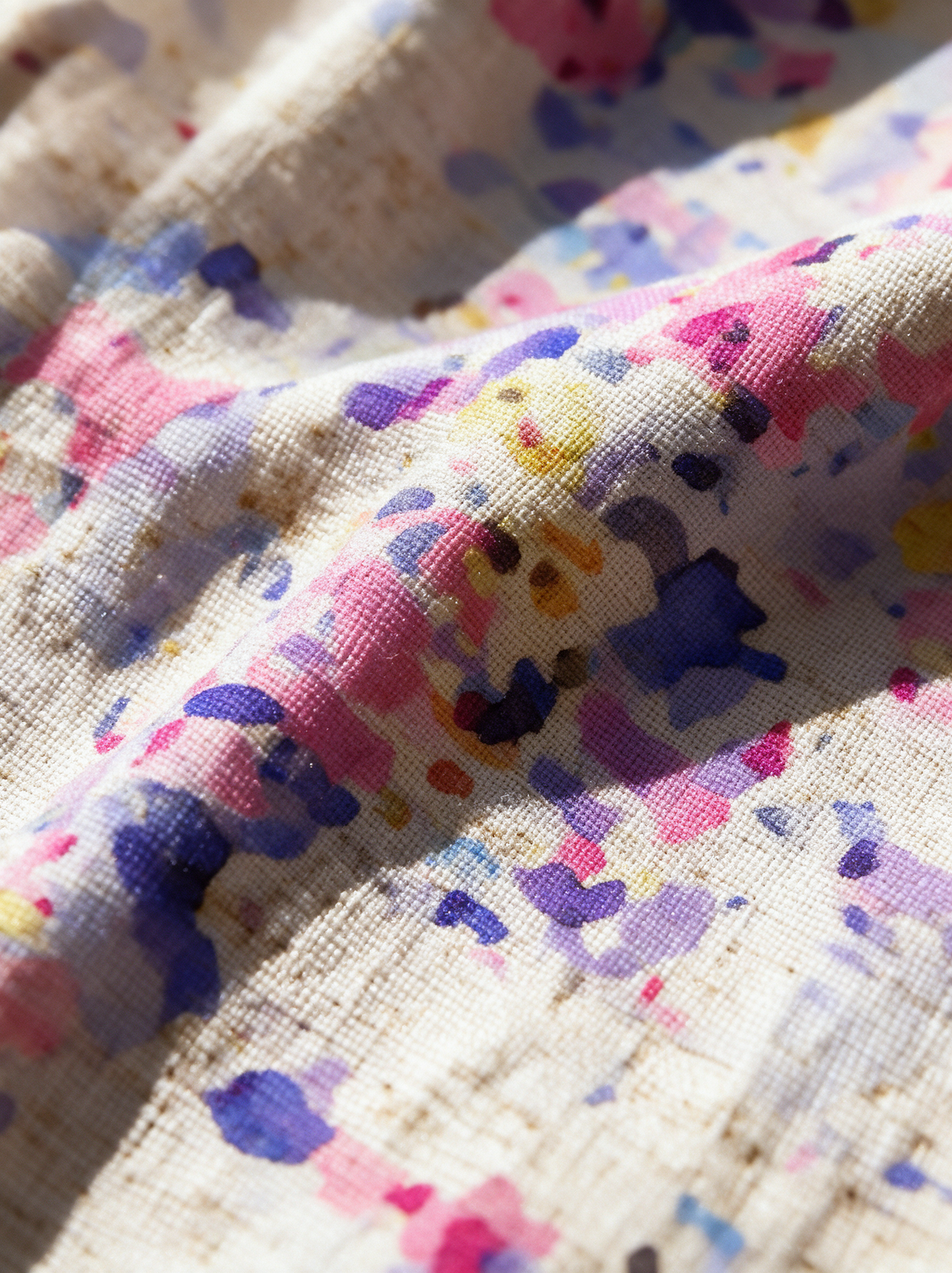 Seraphine floral dress fabric weave and print macro detail