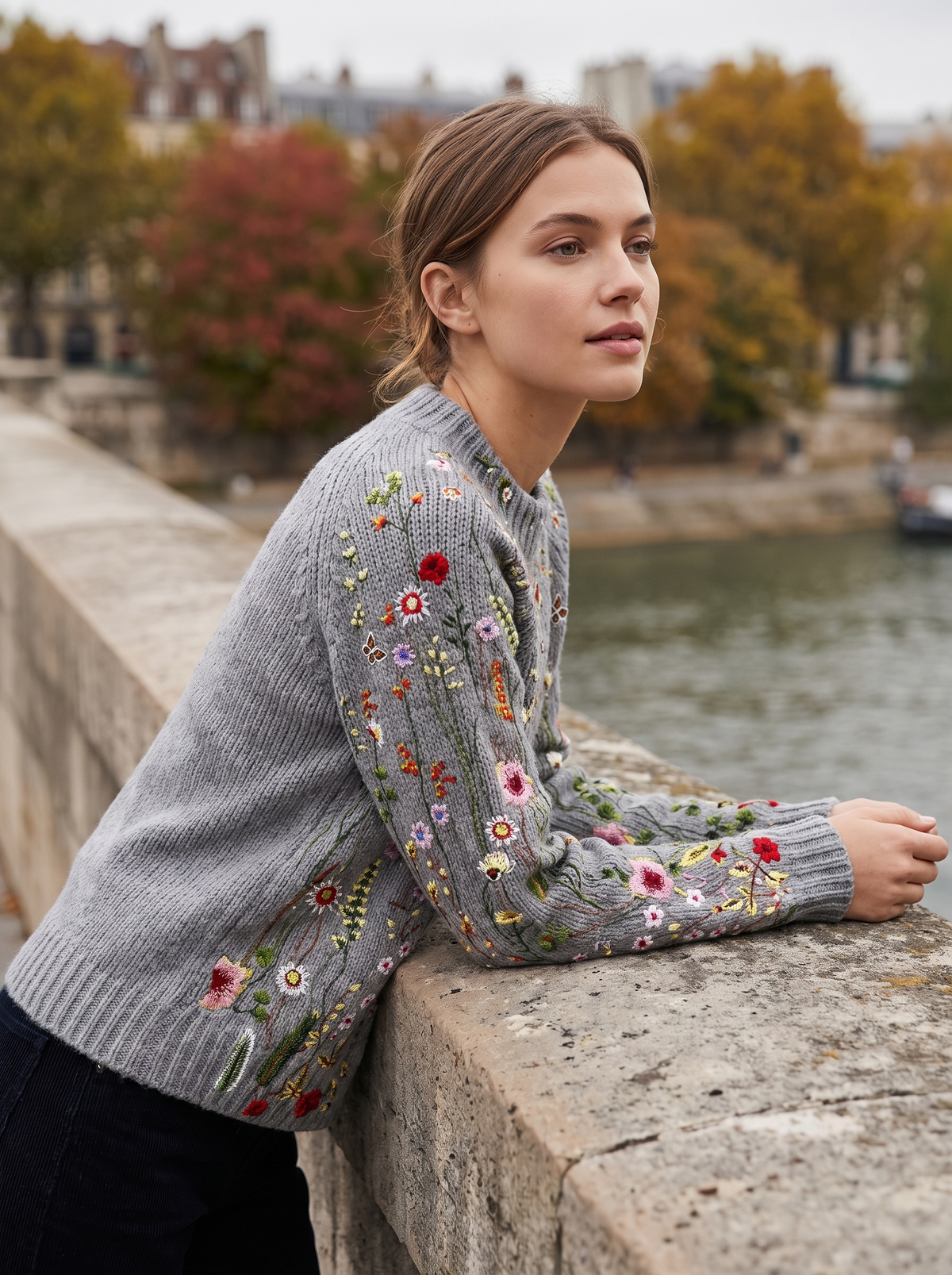 Fleurine floral print floral ribbed knit sweater worn by a model on a city bridge in autumn