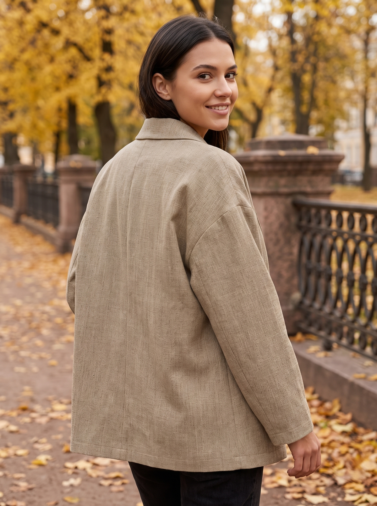 Eulalie khaki oversized blazer worn by a model on an autumn park path in autumn