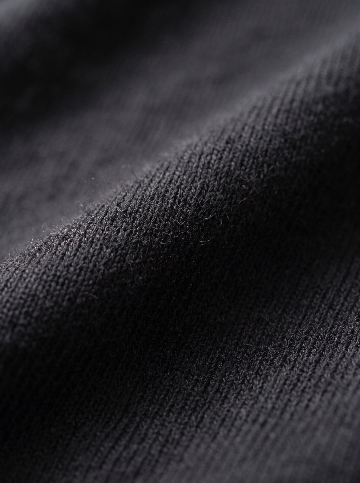 Close up of the fabric of the Hesper oversized roll neck knit top