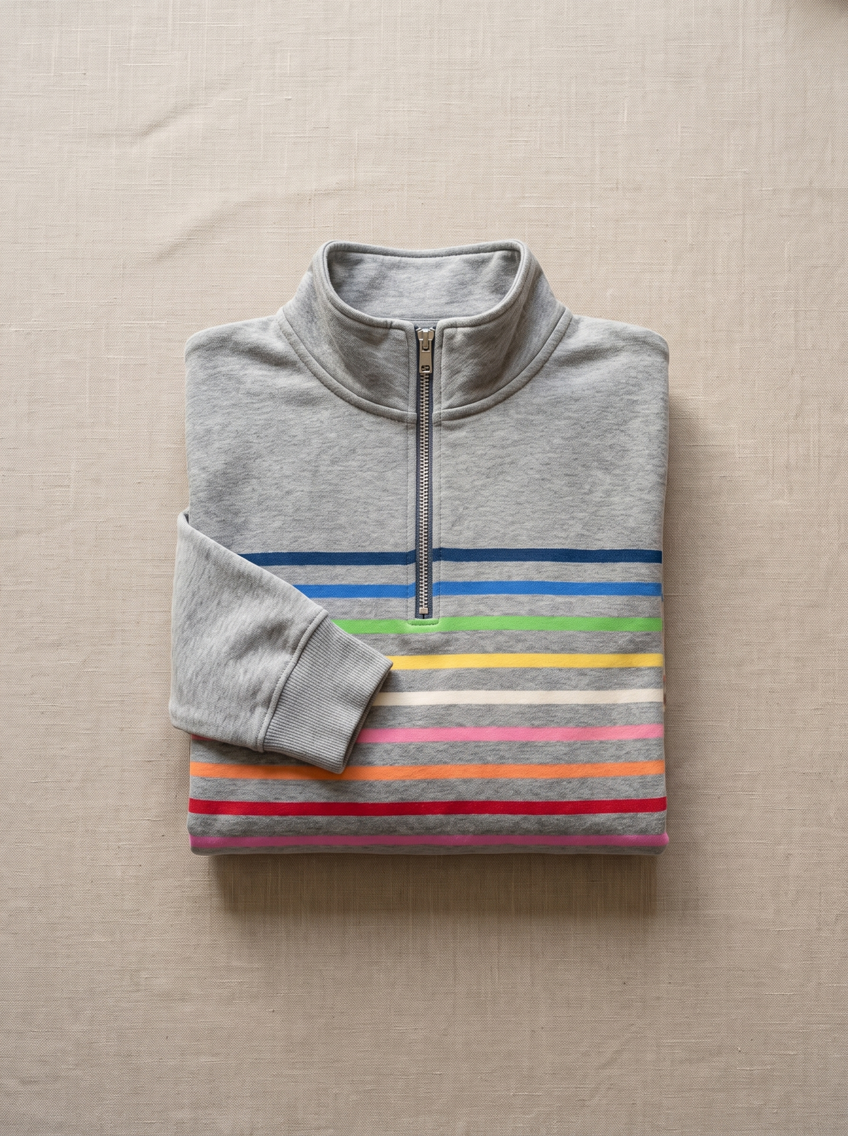 Thomasine half zip sweatshirt folded neatly on a table