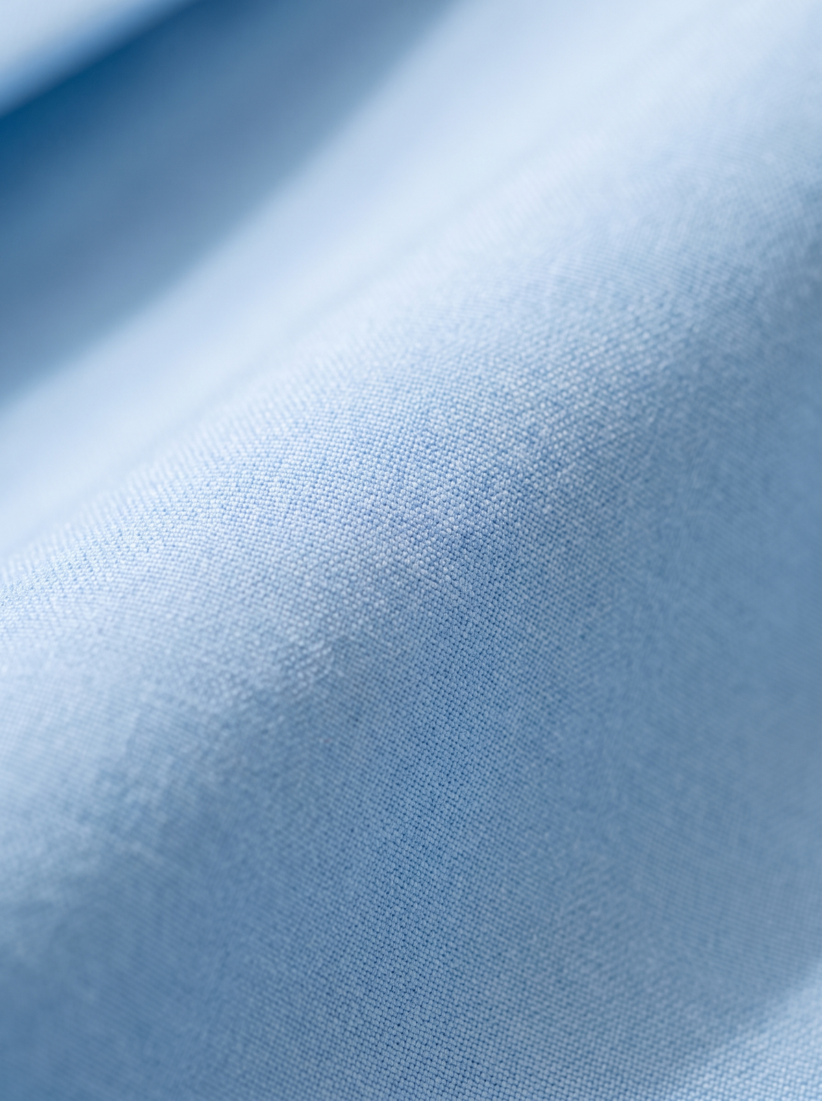 Close up of the fabric of the Xaviera double breasted blazer suit set